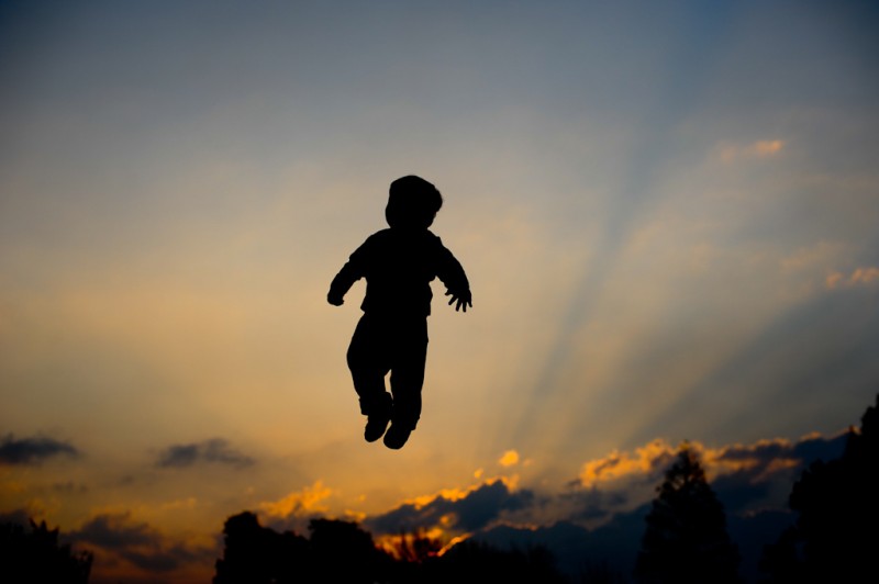 Child tossed in the air