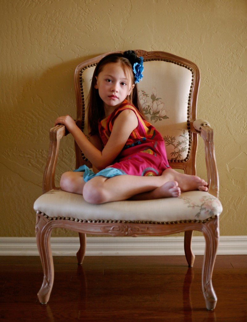 Girl sitting in a chair