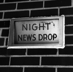 Vintage newspaper sign "Night News Drop"