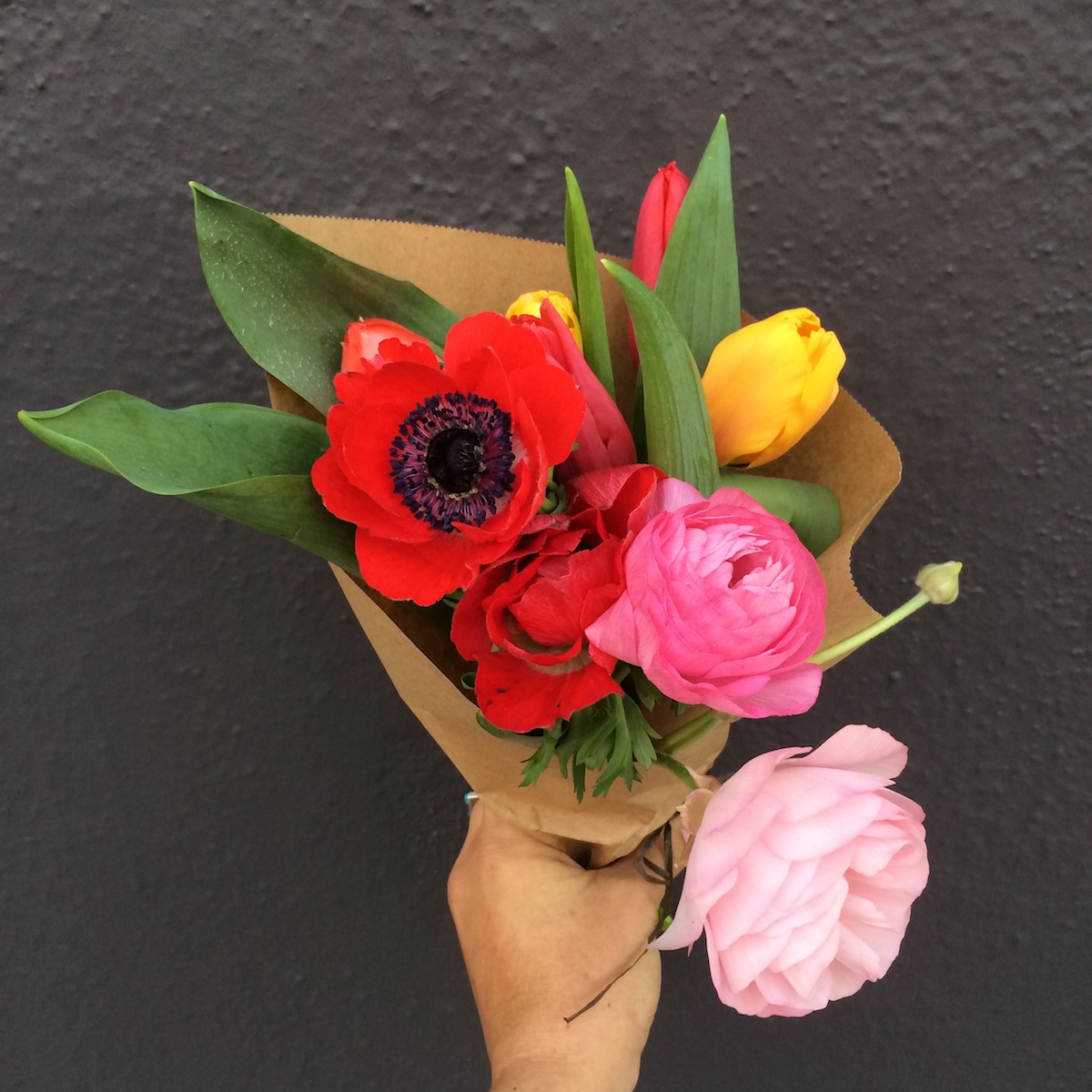 Raunculus and tulips in hipster bridal bouquet