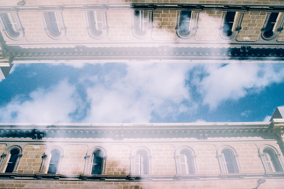 buildings sky clouds reflection