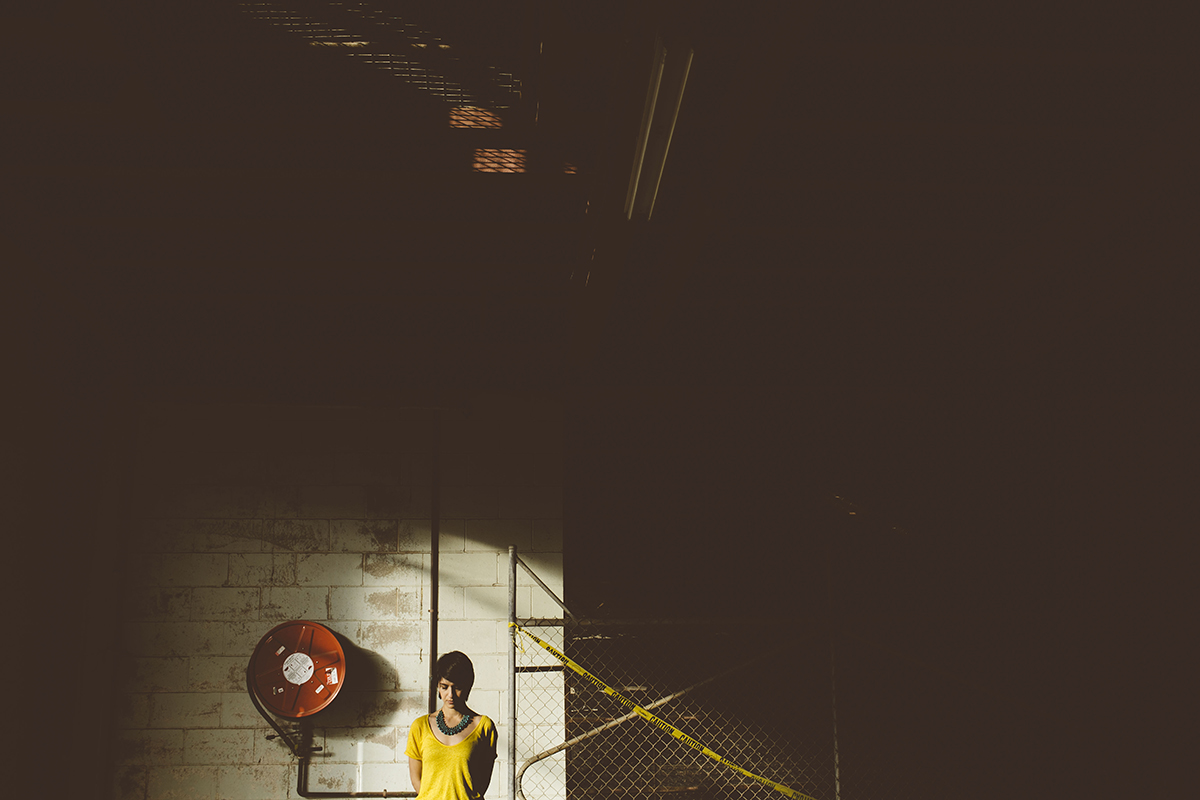 Woman in industrial warehouse